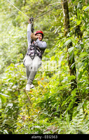 Adult Tourist Wearing Casual Clothing On Zip Line Trip Tungurahua Province Ecuador Stock Photo