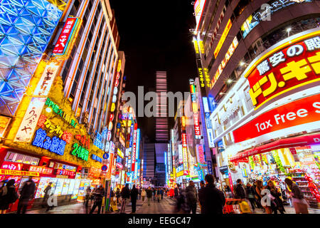 TOKYO - NOVEMBER 13: Billboards in Shinjuku's Kabuki-cho district November 13, 2014 in Tokyo, JP. The area is a nightlife distri Stock Photo