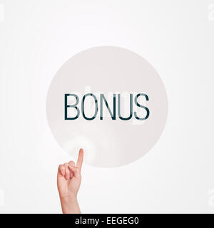 Female finger pressing Bonus button on touchscreen virtual display. Stock Photo