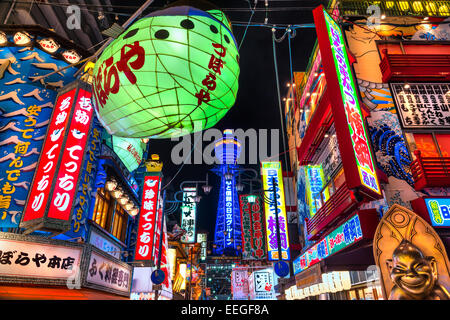 OSAKA - NOVEMBER 24: Tsutenkaku Tower in Shinsekai (new world) district at night on November 24, 2014, in Osaka. It is a tower a Stock Photo