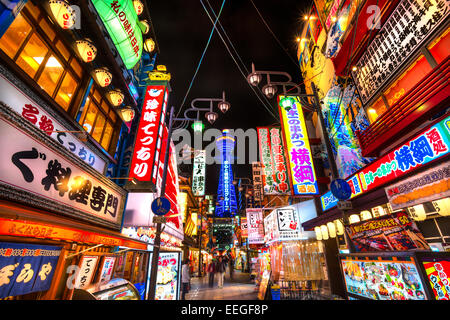 OSAKA - NOVEMBER 24: Tsutenkaku Tower in Shinsekai (new world) district at night on November 24, 2014, in Osaka. It is a tower a Stock Photo