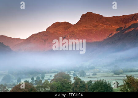The Langdale Pikes at dawn, Lake District, Cumbria England UK Stock Photo