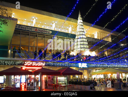 SouthBank centre at Christmas with tree, lights and busy alfresco restaurants London SouthBank SE1 Stock Photo