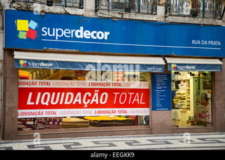 LISBON - JANUARY 13TH: Closing down sale sign at superdecor on January the 13th, 2015, in Lisbon, Portugal. Many Portuguese busi Stock Photo