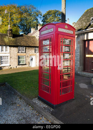 UK, Derbyshire, Tideswell, Fountain Square, old K6 Phone Box used to display local heritage photographs