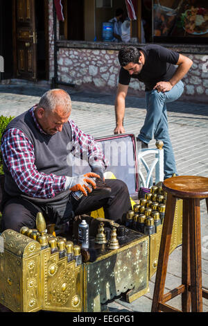 A man shining shoes on the street in Sultanahmet, Istanbul, Turkey, Eurasia. Stock Photo