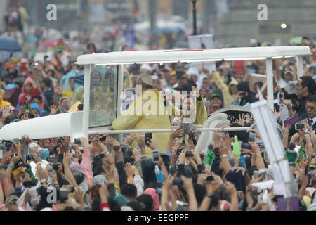 Manila, Philippines. 18th Jan, 2018. A woman waves at Pope Francis at the Quirino Grandstand, Rizal Park in his closing mass on January 18, 2015. The mass was attended by an estimate of 6-7 million people. Photo by Mark Cristino. Credit:  Mark Fredesjed Cristino/Alamy Live News Stock Photo
