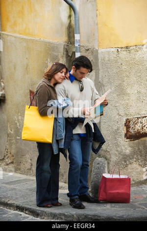 Couple in Florence Italy looking at street map Stock Photo