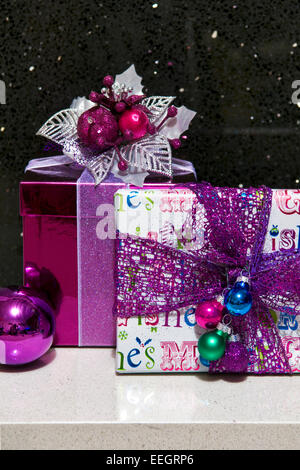 Close up of prettily wrapped Chistmas presents in modern theme and colours Stock Photo