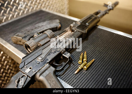 AK47 assault rifle magazine and ammunition at a gun range Stock Photo