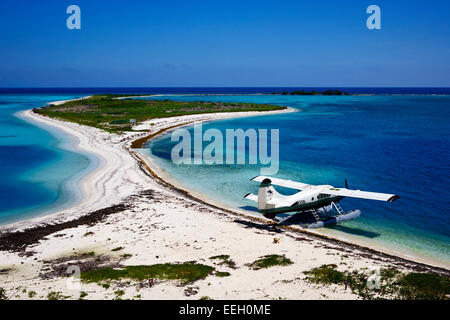 dehaviland dhc-3 otter seaplane on the beach and bush key at the dry tortugas florida keys usa Stock Photo