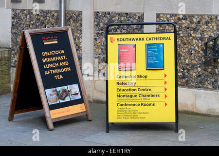 Food and information A-boards outside Southwark Cathedral refectory on London England Stock Photo