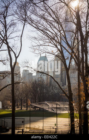 The  90 story luxury tower One57, center, on West 57th Street in Midtown Manhattan in New York is seen casting its shadow over Central Park on Saturday, January 17, 2015. A record has been set with the an undisclosed buyer purchasing a duplex in the luxury tower for the uber-rich for $100,471,452.77. The buyer purchased the 89th and 90th floors on the over 1000 foot tall residential building. (© Richard B. Levine) Stock Photo