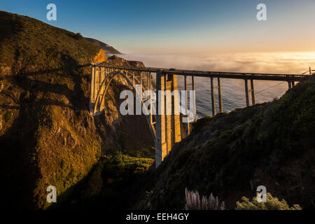 Bixby Bridge Pacific Coast Highway Big Sur California. Bixby Creek Canyon Bridge with coastal fog mist rolling in from the ocean Stock Photo