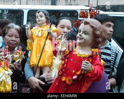 Manila, Philippines. 18th Jan, 2015. Thousands of Roman Catholic devotees flock at Tondo Church bringing their statues of Sto. Nino or Infant Jesus for the annual Feast of the Infant Jesus, where it coincides with the last holy mass of Pope Francis at the Quirino Grandstand. Credit:  Sherbien Dacalanio/Pacific Press/Alamy Live News Stock Photo