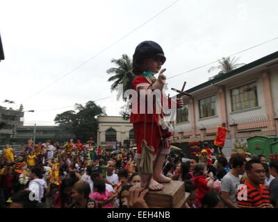 Manila, Philippines. 18th Jan, 2015. Thousands of Roman Catholic devotees flock at Tondo Church bringing their statues of Sto. Nino or Infant Jesus for the annual Feast of the Infant Jesus, where it coincides with the last holy mass of Pope Francis at the Quirino Grandstand. Credit:  Sherbien Dacalanio/Pacific Press/Alamy Live News Stock Photo