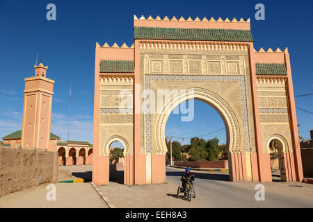 Modern oriental city gate of Rissani with minaret. Rissani. Morocco. North Africa. Africa Stock Photo