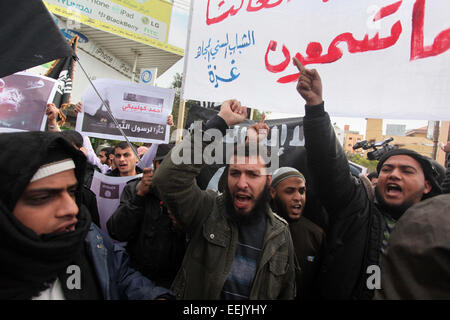 Jan. 19, 2015 - Gaza City, Gaza Strip, Palestinian Territory - Palestinian Salafists shout during a protest against satirical French weekly magazine Charlie Hebdo's cartoons of the Prophet Mohammad, in Gaza city January 19, 2015. Dozens of Jihadist Salafi men rallied in Gaza on Monday to condemn continued publication by French satirical magazine Charlie Hebdo of cartoons deemed offensive to Islam's Prophet. Charlie Hebdo published a picture of Mohammad weeping on its cover last week after gunmen stormed its offices in Paris, killing 12 people. The gunmen said the attack was revenge for cartoon Stock Photo