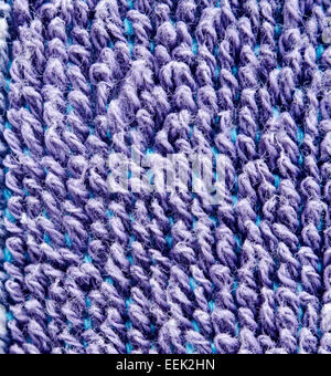 Background texture of a closeup of towel with violet rings of sponge Stock Photo