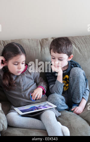 Children with tablet Stock Photo