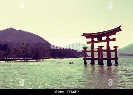 Color toned picture of floating gate (O-Torii) in Miyajima island, Japan Stock Photo