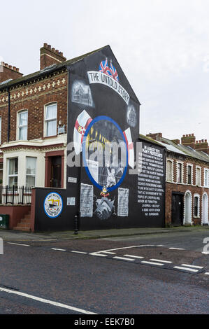 Ulster loyalist wall mural on corner of Canada St Belfast depicting loyalist fleeing to Liverpool.