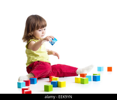 kid playing wooden toys Stock Photo