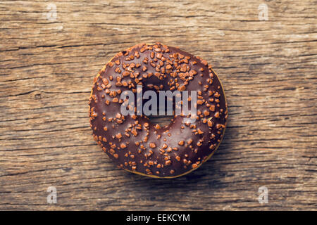 chocolate donut on wooden table Stock Photo