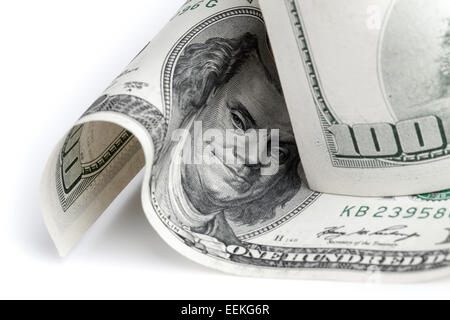 United States dollars. Fragment of hundred USD banknotes on white table. Selective focus Stock Photo