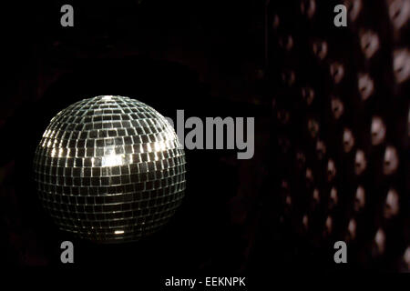Abstraction of white lights reflecting off a disco party ball Stock Photo