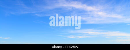Panorama of blue sky and white fluffy clouds . Stock Photo