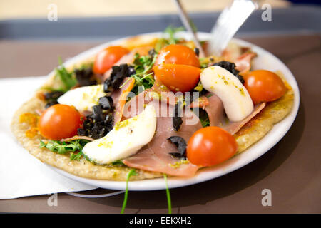 freshly made portuguese pizza. Stock Photo