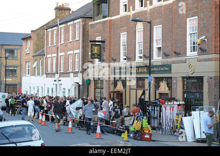Tom Hardy and Emily Browning on set of their new film 'Legend'  Featuring: View Where: London, United Kingdom When: 17 Jul 2014 Stock Photo