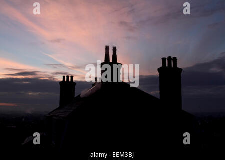 Wimbledon, London, UK. 20th Jan, 2015. Steam billows form rooftops on a cold morning with freezing temperatures in southwest London Credit:  amer ghazzal/Alamy Live News Stock Photo