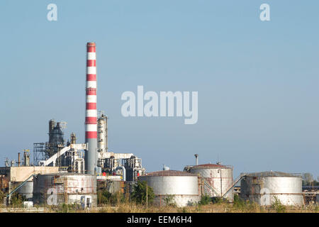 Oil refinery installations with water containers for cooling in various petrochemical processes Stock Photo