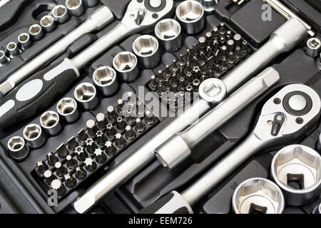 Set of tools made of chrome vanadium alloy, containing wrenches and different size bits and tubular extensions in a multipurpose Stock Photo
