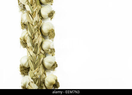 Two braids of white garlic side by side, isolated on white Stock Photo