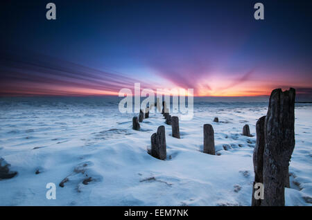 Lake Michigan at sunrise in the snow, Evanston, Illinois, USA Stock Photo