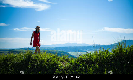 Woman hiking in mountains Stock Photo