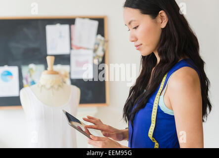 Designer using digital tablet Stock Photo