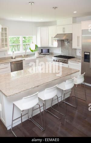 Breakfast bar, stools and counters in modern kitchen Stock Photo