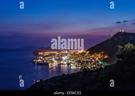 Aerial view of coastal city illuminated at night, Dubrovnik, Dubrovnik-Neretva, Croatia Stock Photo