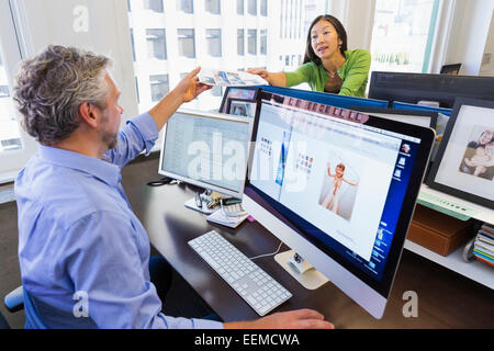Business people working together in office Stock Photo