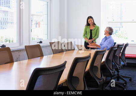 Business people talking in conference room Stock Photo