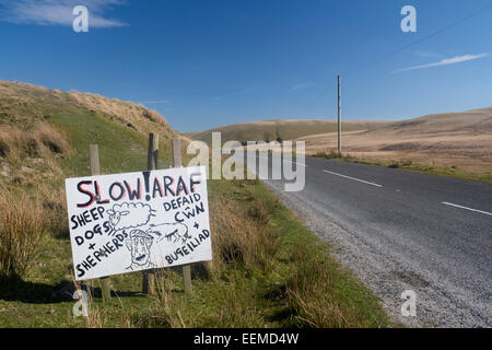 Araf Slow humorous cartoon style hand painted unofficial road sign on Cwmystwyth to Elan Valley mountain road Powys Mid Wales UK Stock Photo