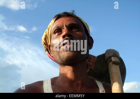 Bangladesh 10 January 2015. Farmer using cell phone . Stock Photo