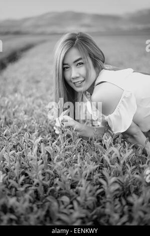 black and white Portrait Thai woman in tea plantation , Chiangrai Thailand Stock Photo