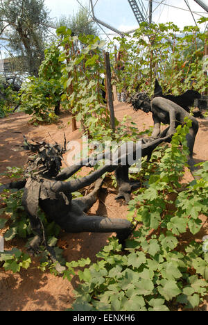 Sculptures representing the rites of Dionysus in the Mediterranean Biome at the Eden Project, Cornwall, UK. Stock Photo
