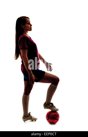 silhouette of girl playing football on the white Stock Photo