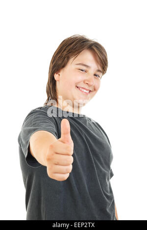 cute young male chubby kid or boy smiling and confidently posing with thumb up in black dark t-shirt on white background Stock Photo